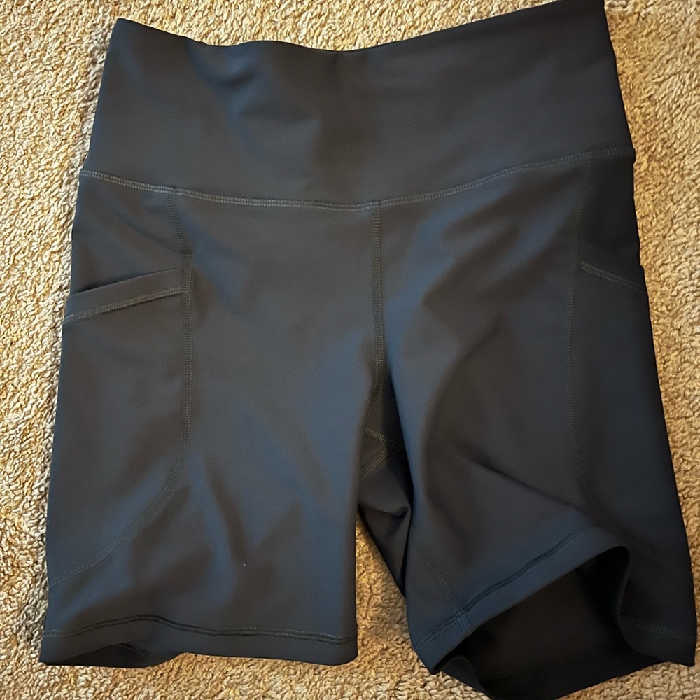 Navy blue 6” biker shorts with pockets
